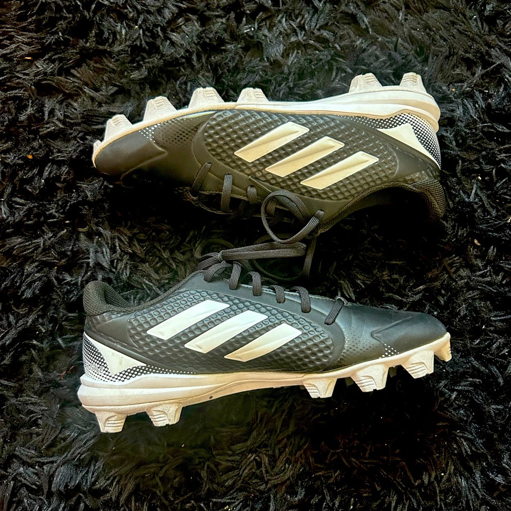 Women’s athletic cleats; size 9; lightly worn